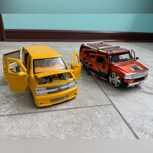 Set of 2 Die Cast 1/18 Scale Cars by Dub City - Yellow and Orange